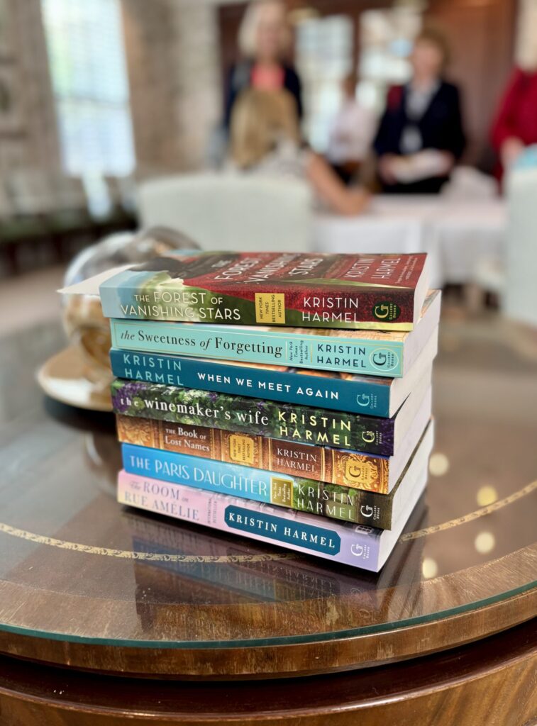 One member brought a tall stack of books for the author to sign.