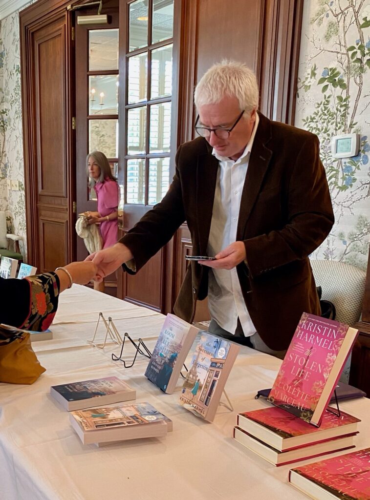 Brian Lampkin of Scuppernong Books of Greensboro brings a gracious supply of books for our luncheons.